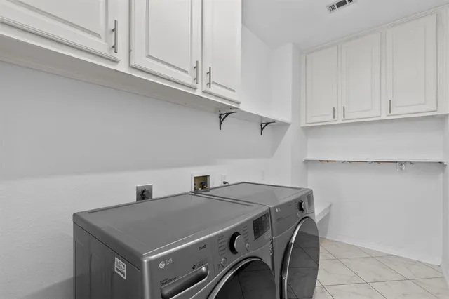 a view of a table and chairs in a kitchen