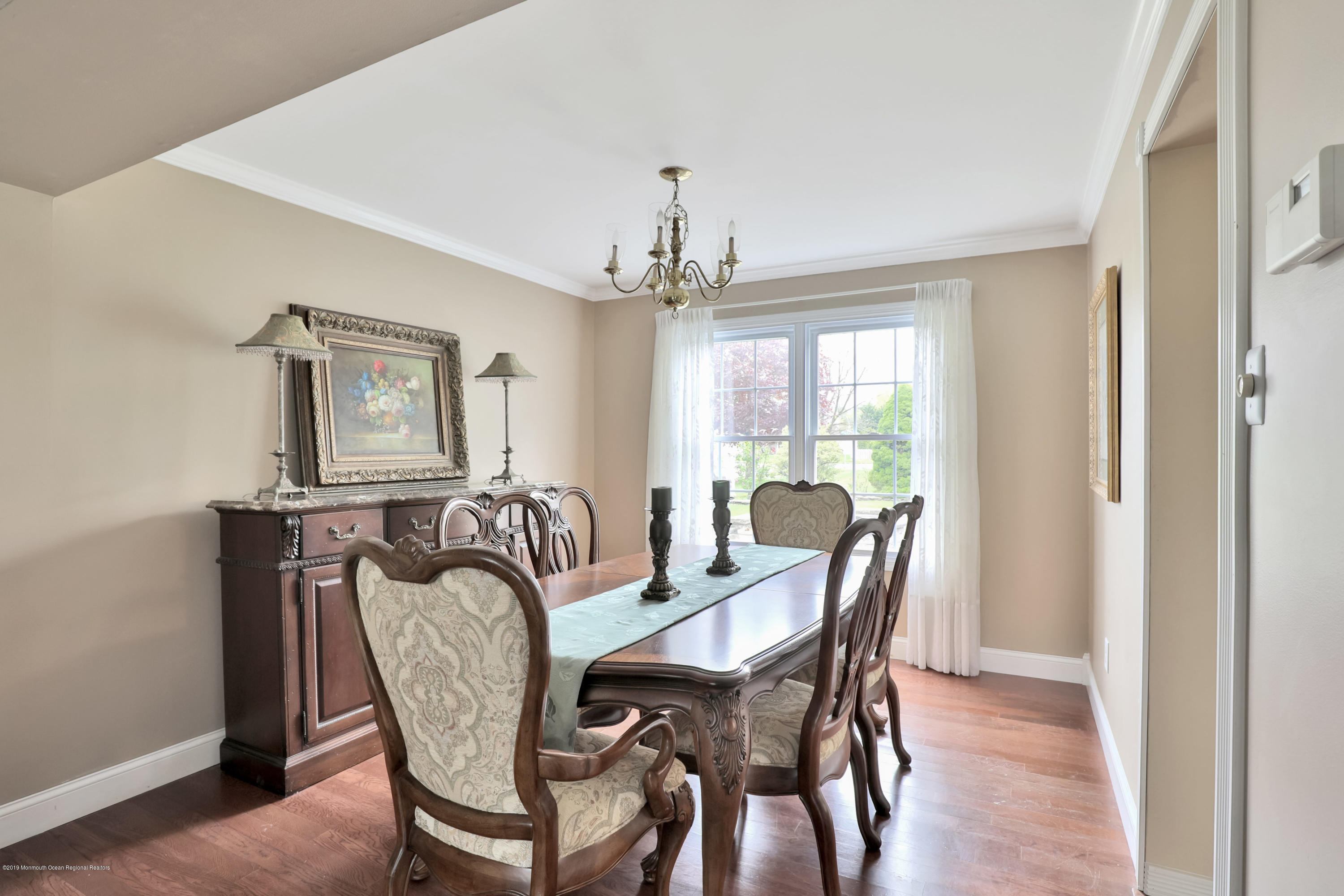 24 Starlight Road Howell, NJ 07731 - Photo 6 of 26 a view of a dining room with furniture window and wooden floor