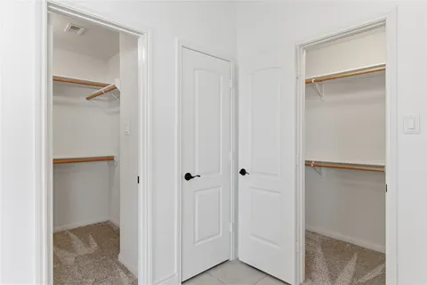 a view of a room that has a window in it