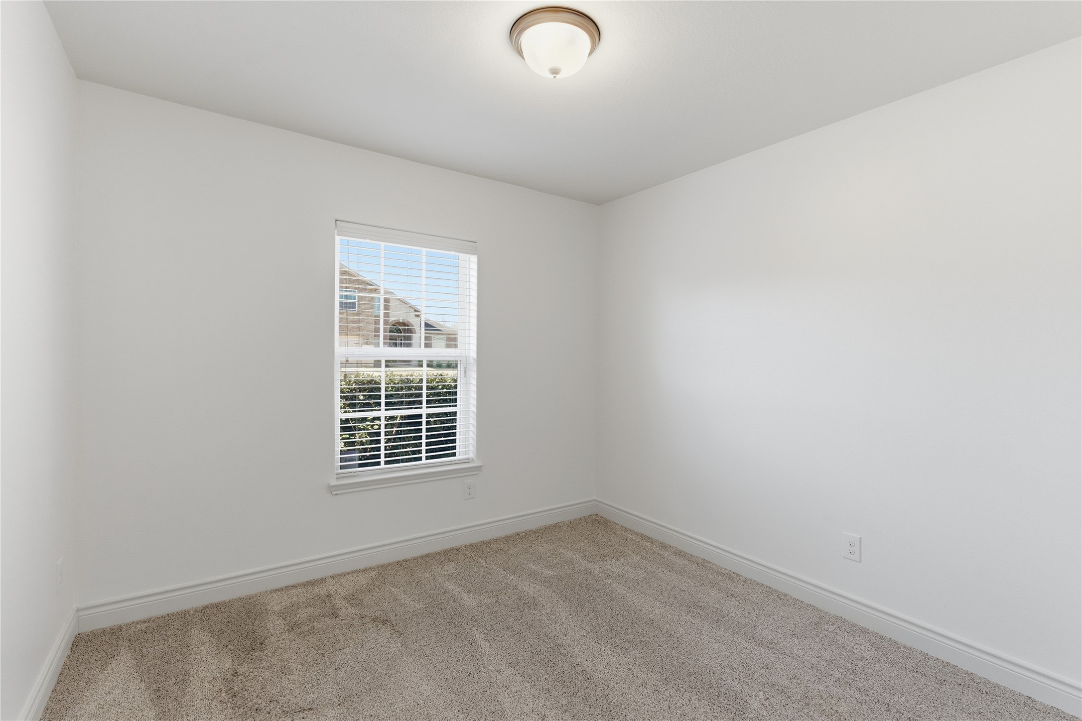 20614 Silver Tea Avenue Hockley, TX 77447 - Photo 21 of 27 a view of a room that has a window in it