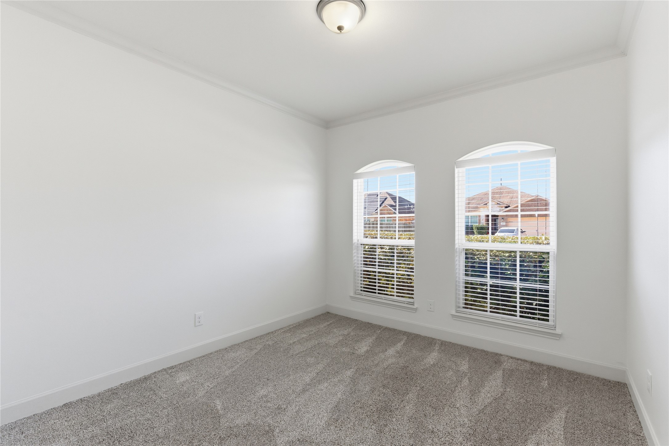 20614 Silver Tea Avenue Hockley, TX 77447 - Photo 23 of 27 an empty room with windows