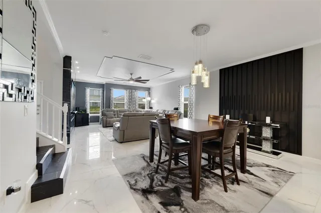 a view of a dining room with furniture