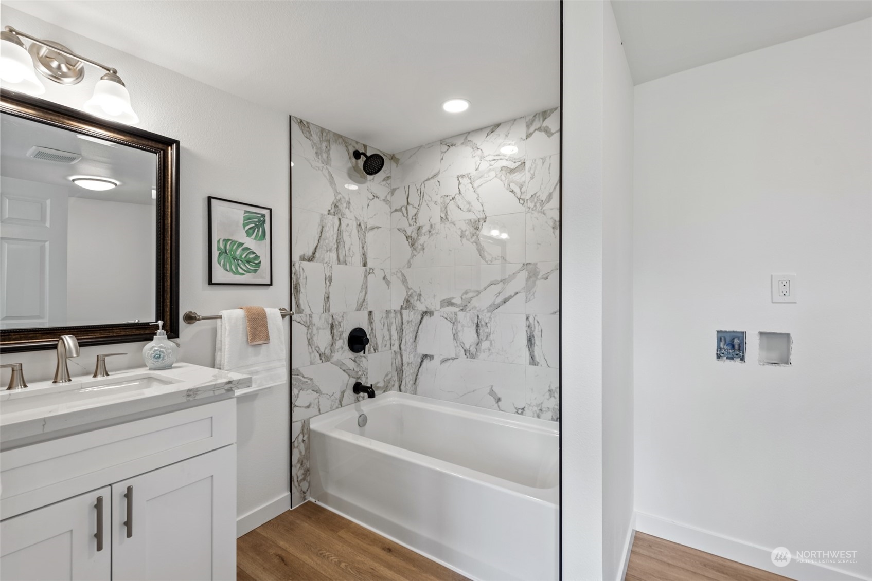 17315 Southeast May Valley Road Renton, WA 98059 - Photo 18 of 25 a bathroom with a tub sink and mirror