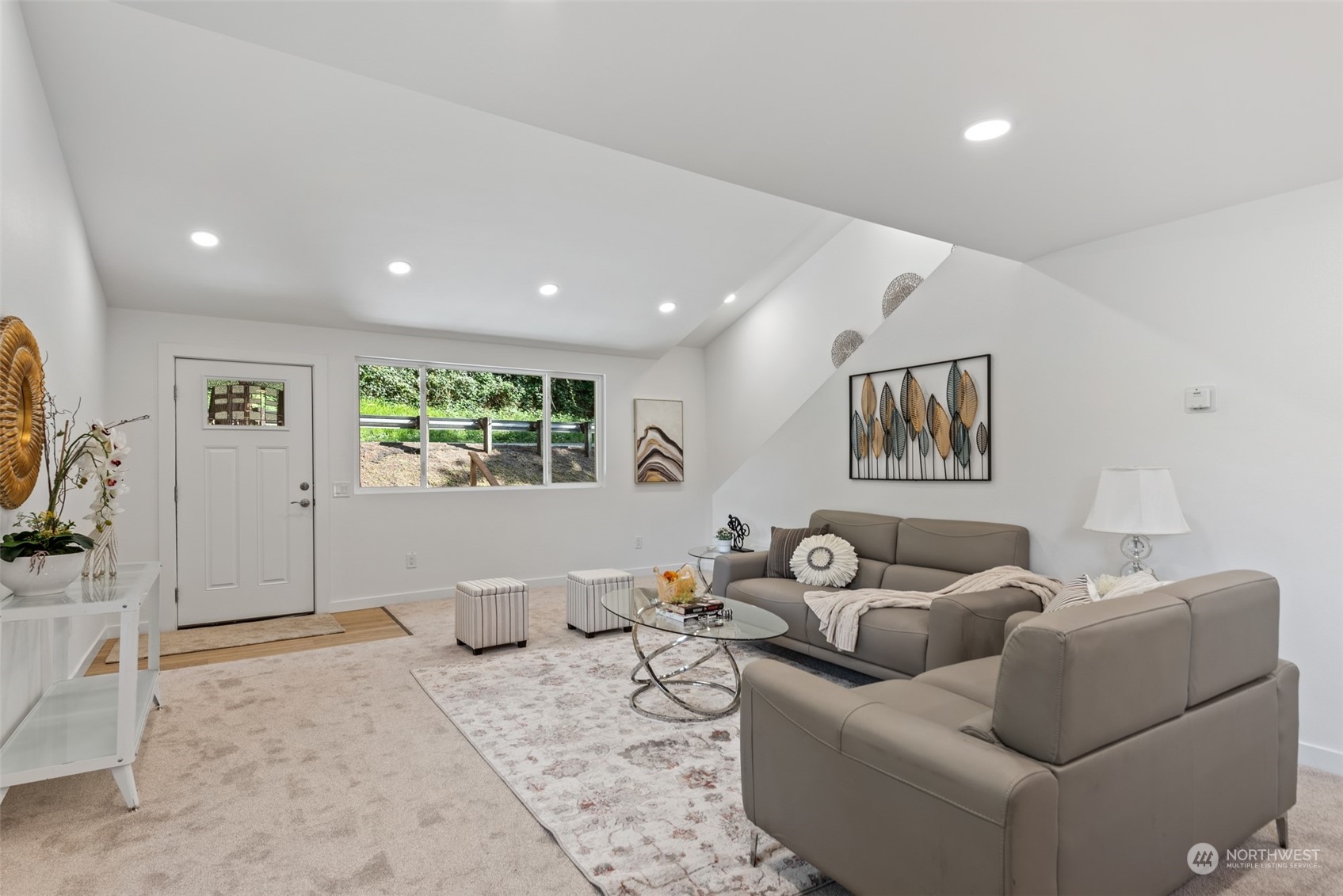 17315 Southeast May Valley Road Renton, WA 98059 - Photo 5 of 25 a living room with furniture and a flat screen tv