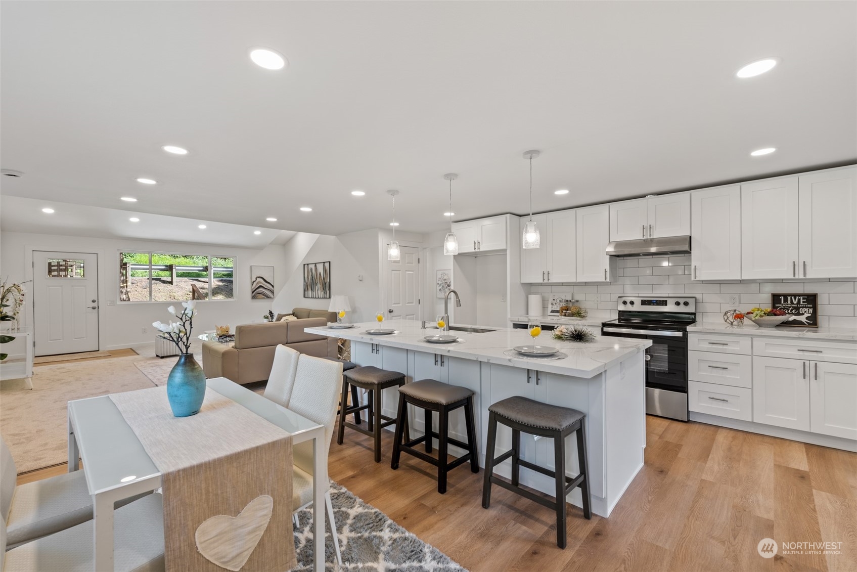 17315 Southeast May Valley Road Renton, WA 98059 - Photo 8 of 25 a kitchen with a table and chairs in it
