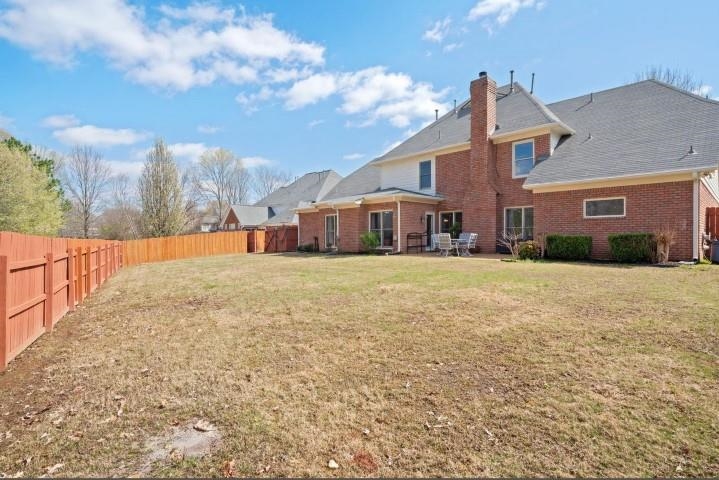 1385 Winoka Road Collierville, TN 38017 - Photo 13 of 16 a front view of a house with a yard