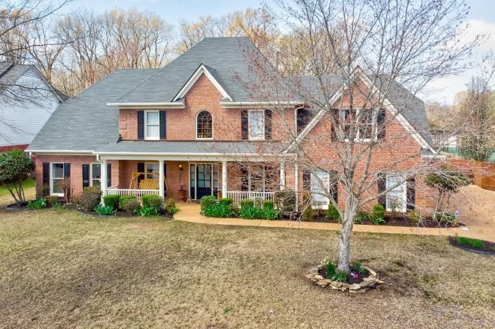 1385 Winoka Road Collierville, TN 38017 - Photo 15 of 16 a front view of a house with a yard