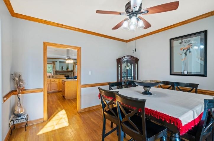 1385 Winoka Road Collierville, TN 38017 - Photo 4 of 16 a dining room with a table and chairs