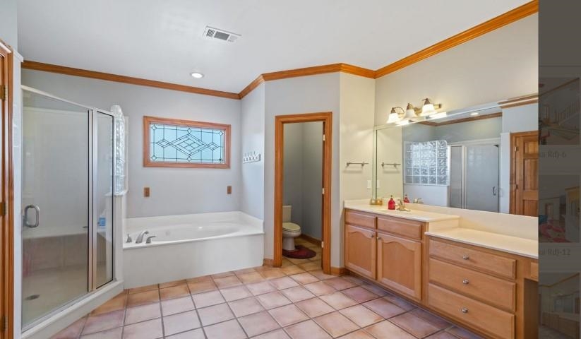 1385 Winoka Road Collierville, TN 38017 - Photo 10 of 16 a bathroom with a tub a sink and a mirror