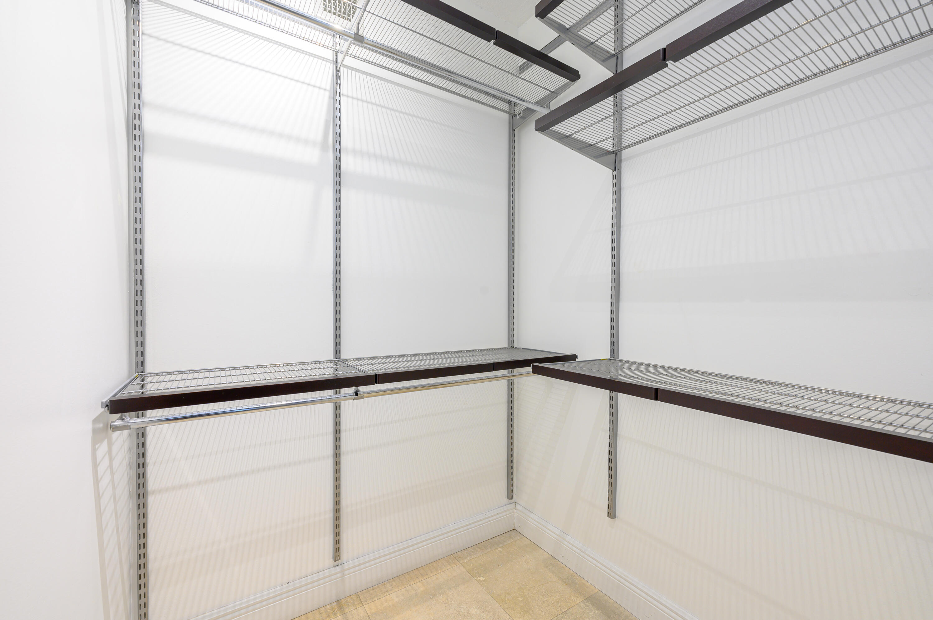 2030 Douglas Road, Unit 807 Coral Gables, FL 33134 - Photo 10 of 12 a view of an empty walk in closet