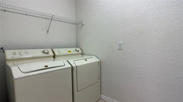 a view of a terrace with chairs