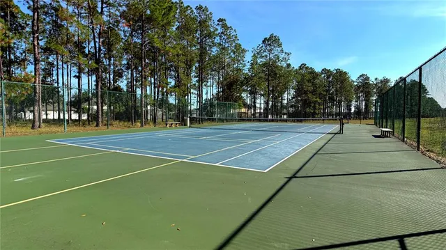 a view of park with swings