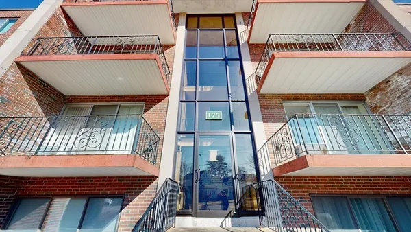 a view of a balcony with door