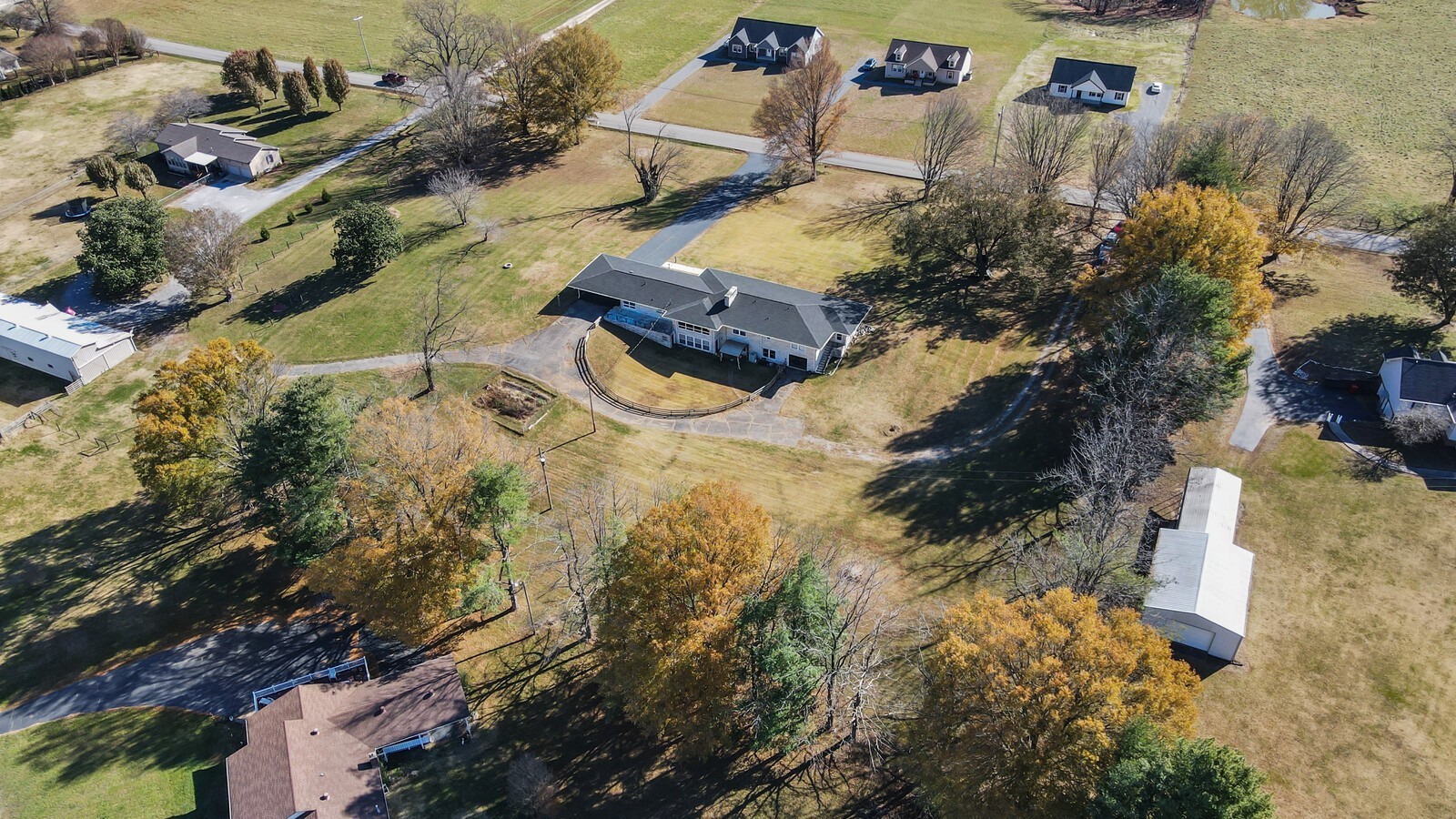 676 Ferguson Hill Road Lafayette, TN 37083 - Photo 83 of 89 an aerial view of residential houses with outdoor space
