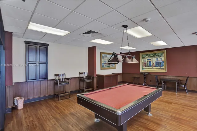 a picture of a glass door with a view of living room