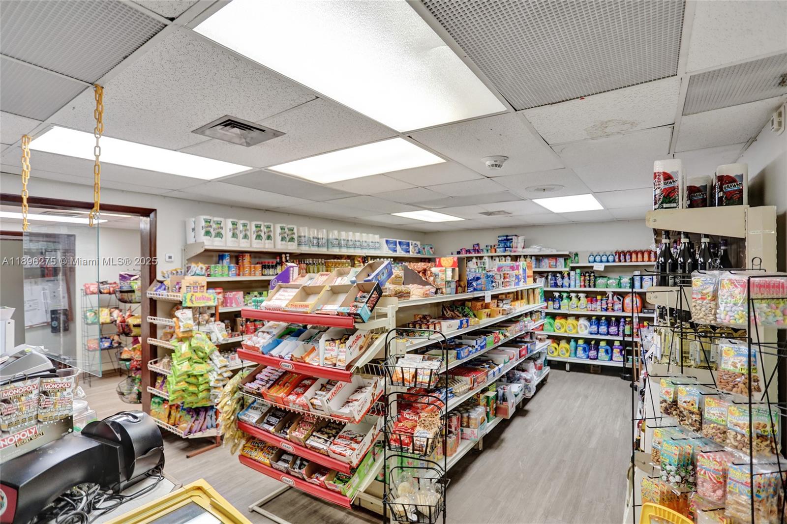 500 Bayview Drive, Unit 731 Sunny Isles Beach, FL 33160 - Photo 33 of 46 a room with lots of books and a large tree