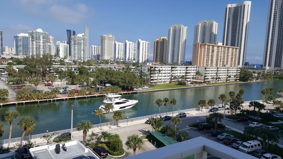500 Bayview Drive, Unit 731 Sunny Isles Beach, FL 33160 - Photo 6 of 46 a view of a lake with tall buildings