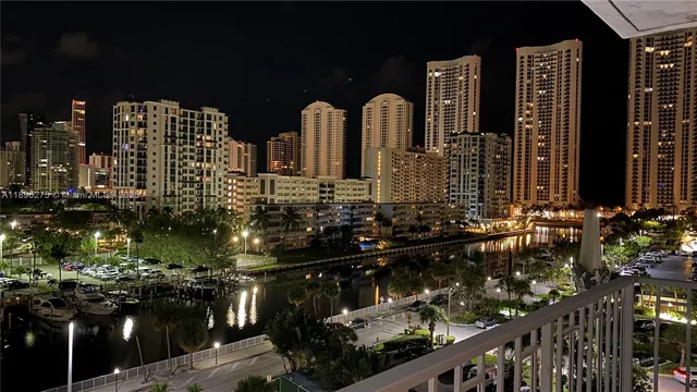a kitchen with a refrigerator stove and microwave
