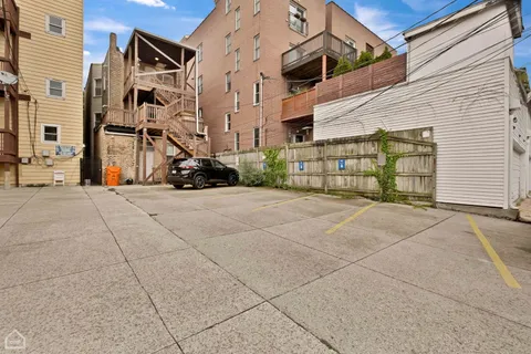 a view of a building with a street