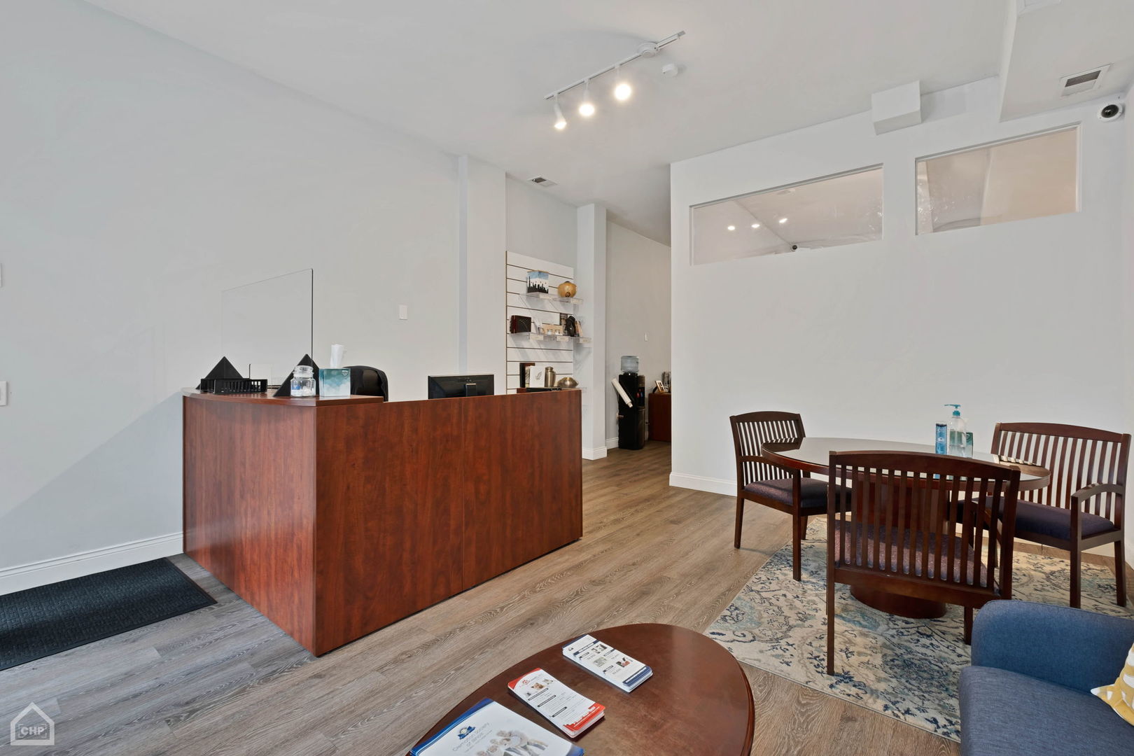 3824 North Clark Street Chicago, IL 60613 - Photo 14 of 16 a living room with furniture and wooden floor