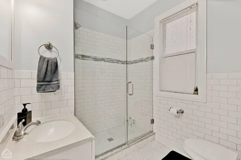 a bathroom with a sink and a shower