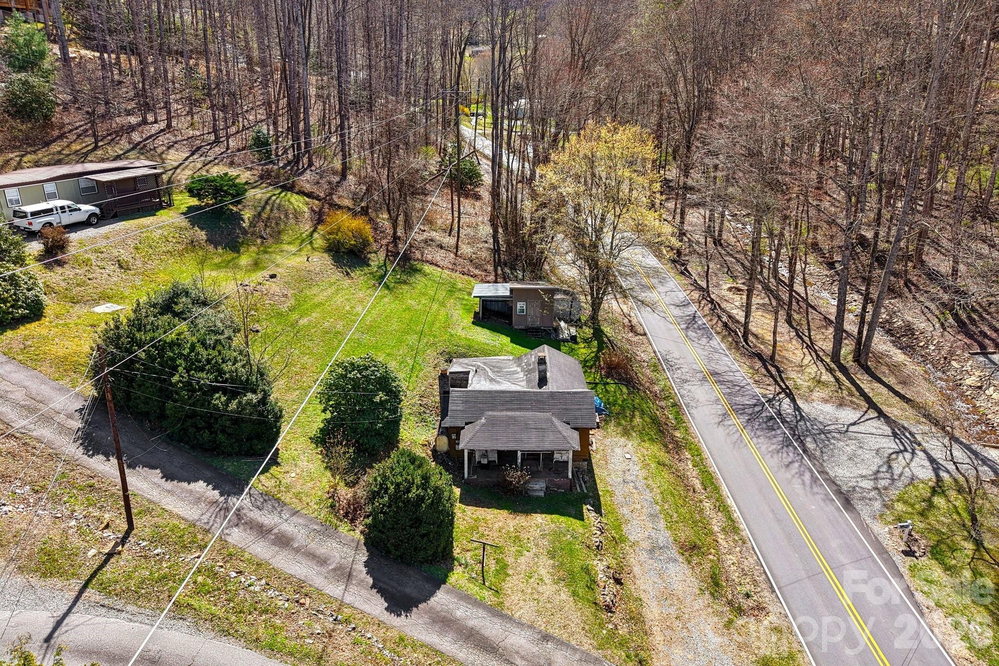 719 Camp Branch Road Waynesville, NC 28786 - Photo 22 of 22 a view of yard with swimming pool
