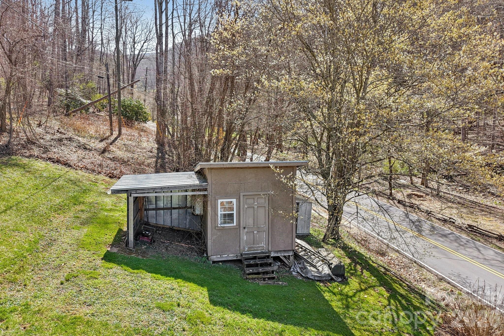 719 Camp Branch Road Waynesville, NC 28786 - Photo 8 of 22 a view of a house with a yard