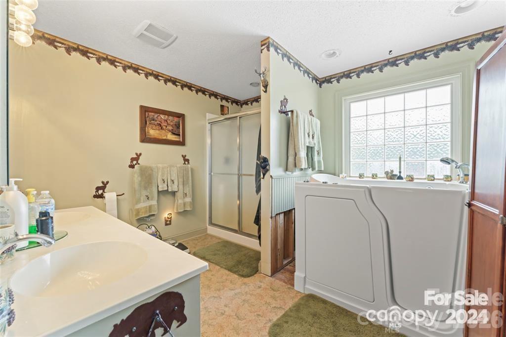 10560 Lake Royalle Road Spring Hope, NC 27882 - Photo 13 of 37 a very nice looking room with a large window
