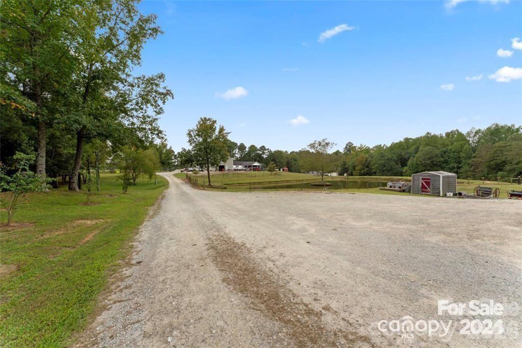 10560 Lake Royalle Road Spring Hope, NC 27882 - Photo 28 of 37 a view of a lake with houses
