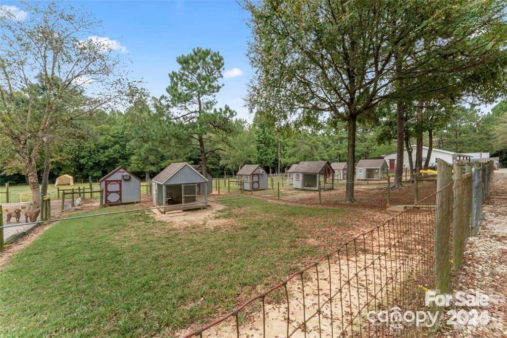10560 Lake Royalle Road Spring Hope, NC 27882 - Photo 33 of 37 a front view of a house with a yard
