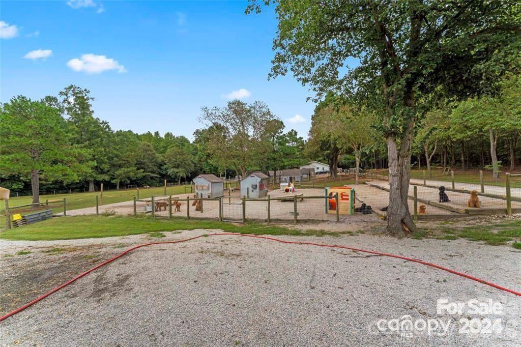 10560 Lake Royalle Road Spring Hope, NC 27882 - Photo 37 of 37 a view of a park with large trees