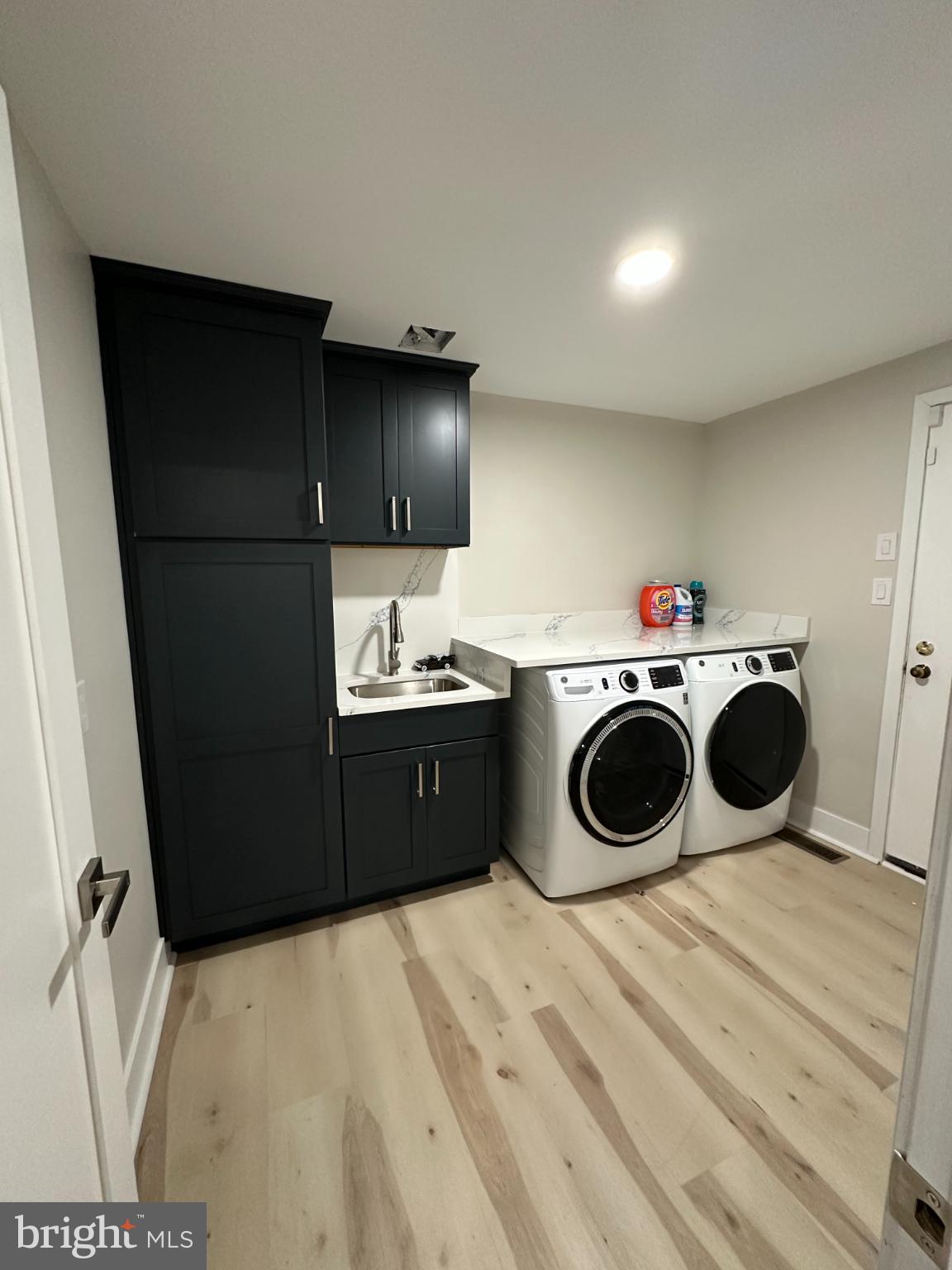 11530 Magnolia Court Issue, MD 20645 - Photo 19 of 31 a kitchen with a stove top oven and cabinets