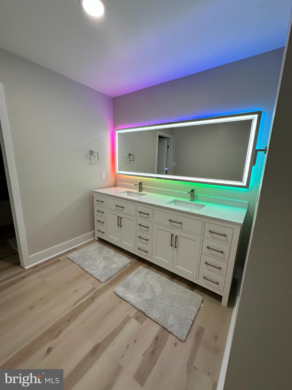 11530 Magnolia Court Issue, MD 20645 - Photo 23 of 31 a bathroom with a sink and a mirror