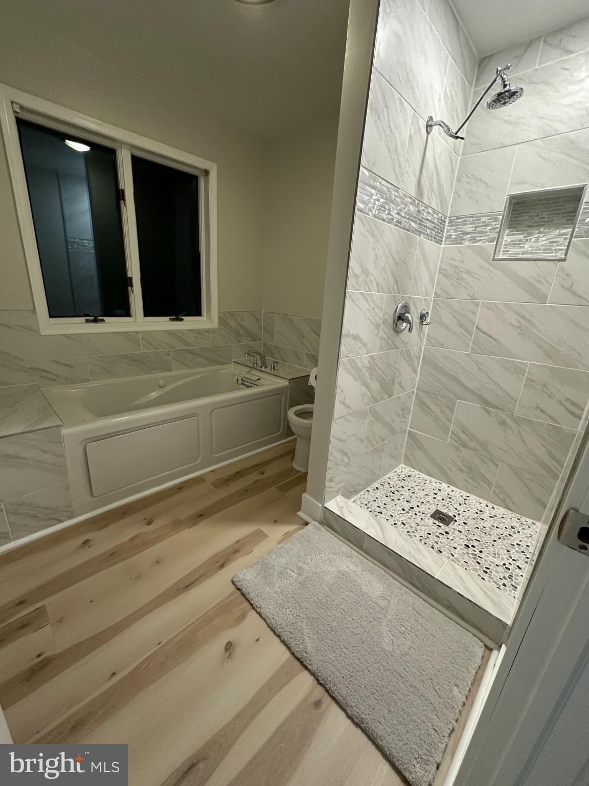 11530 Magnolia Court Issue, MD 20645 - Photo 25 of 31 a view of bathroom with bathtub and shower