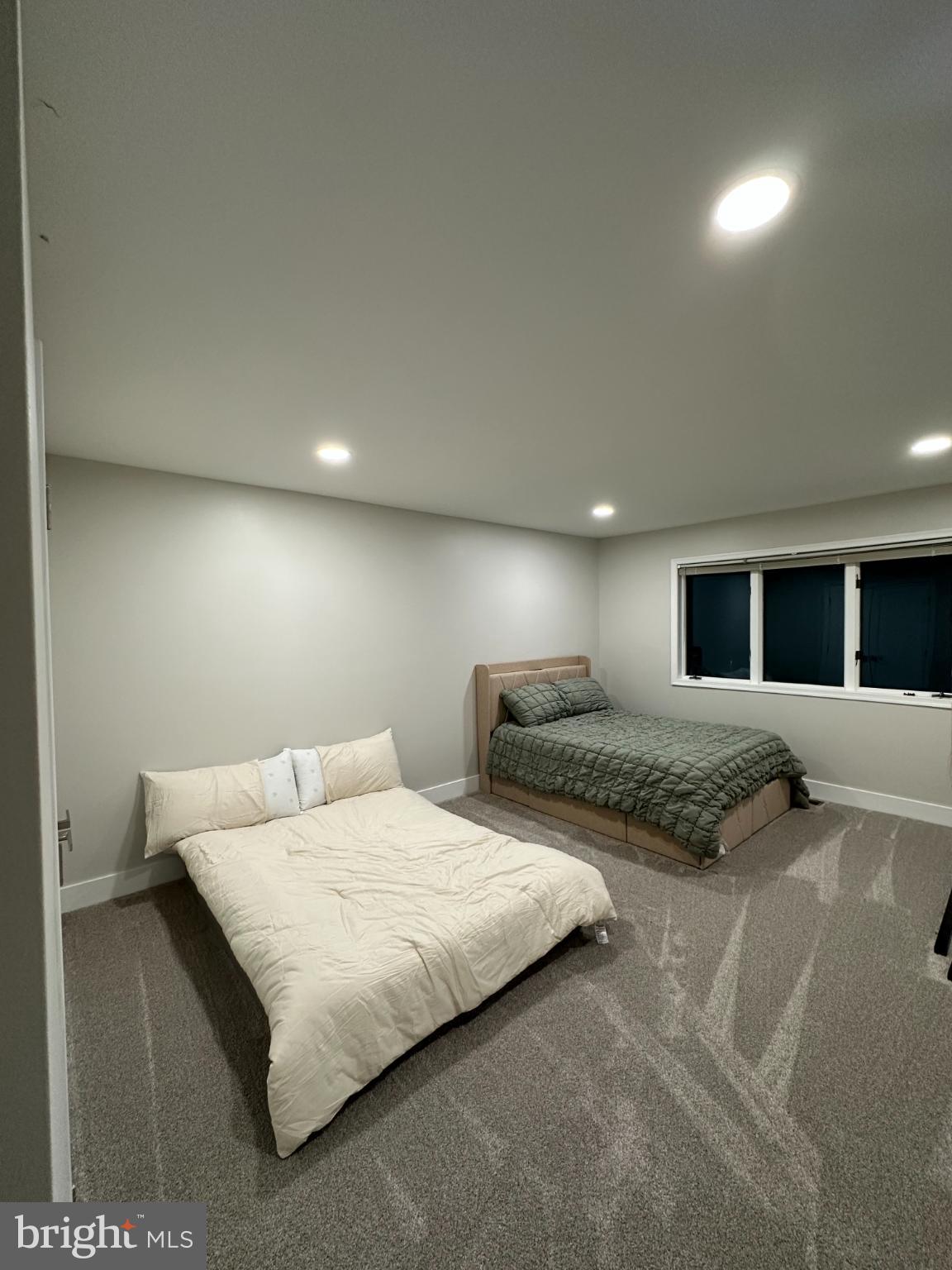 11530 Magnolia Court Issue, MD 20645 - Photo 26 of 31 a bedroom with a bed and a night stand