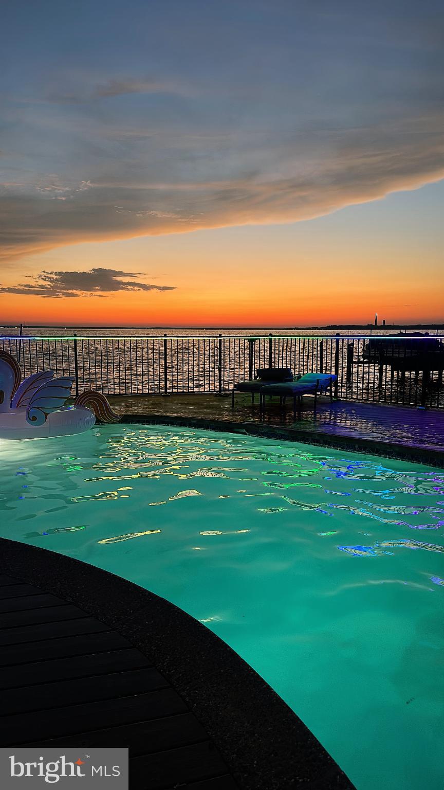 11530 Magnolia Court Issue, MD 20645 - Photo 30 of 31 a view of a yard with a wooden fence