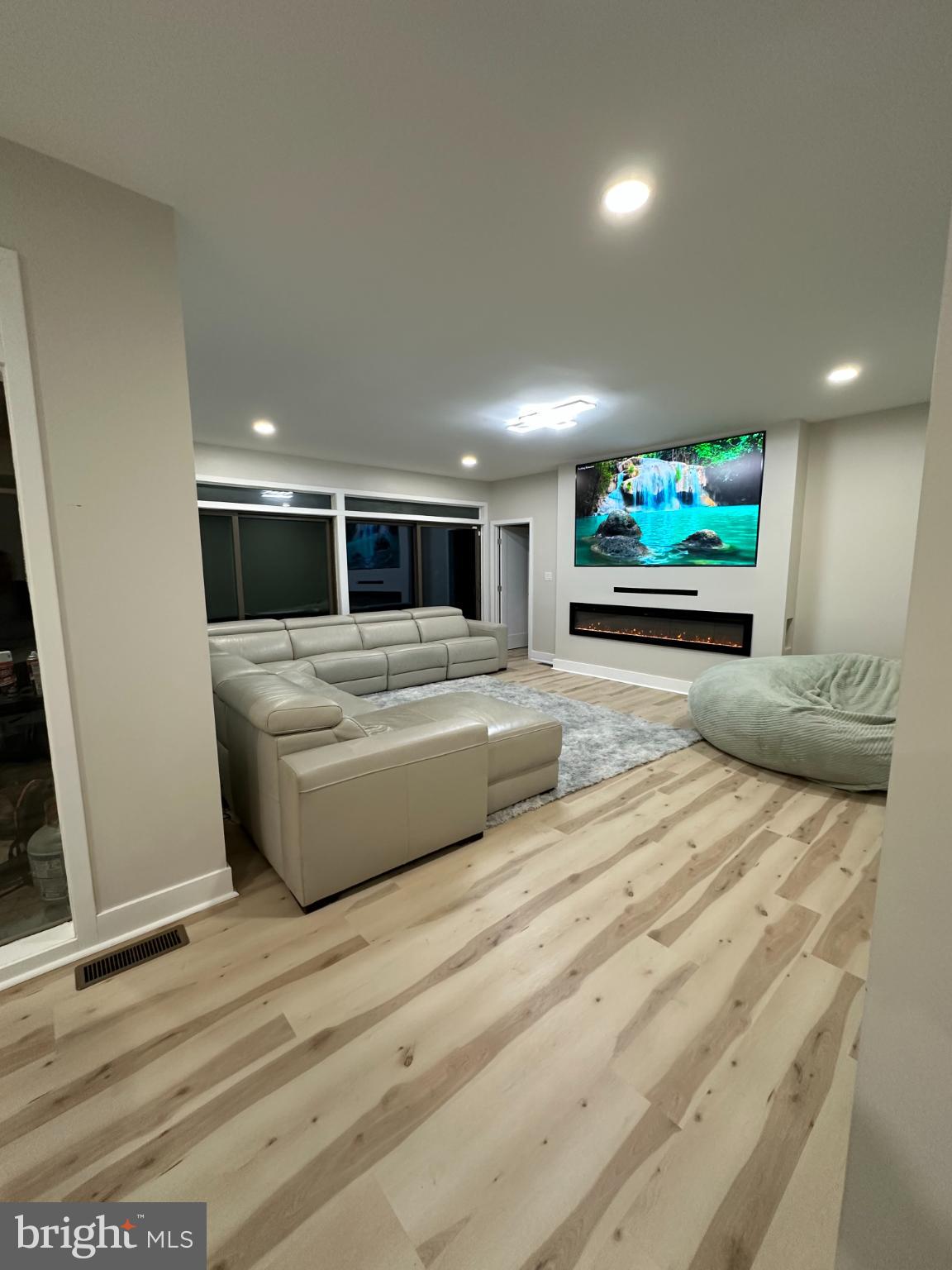 11530 Magnolia Court Issue, MD 20645 - Photo 6 of 31 a view of living room with furniture and a flat screen tv