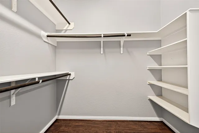 a view of an empty walk in closet