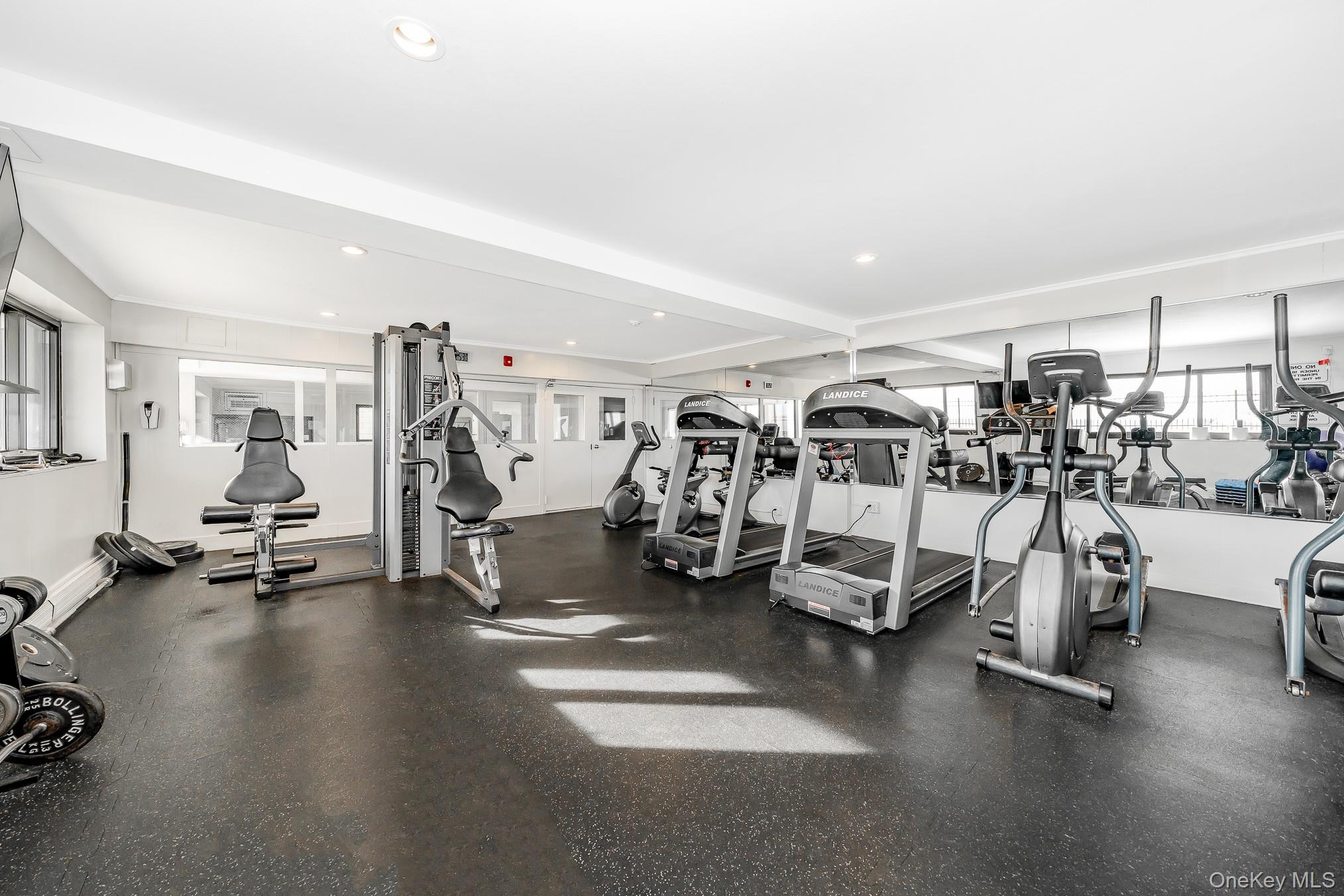 420 Shore Road, Unit 4C Long Beach, NY 11561 - Photo 15 of 41 a view of a room with gym equipment