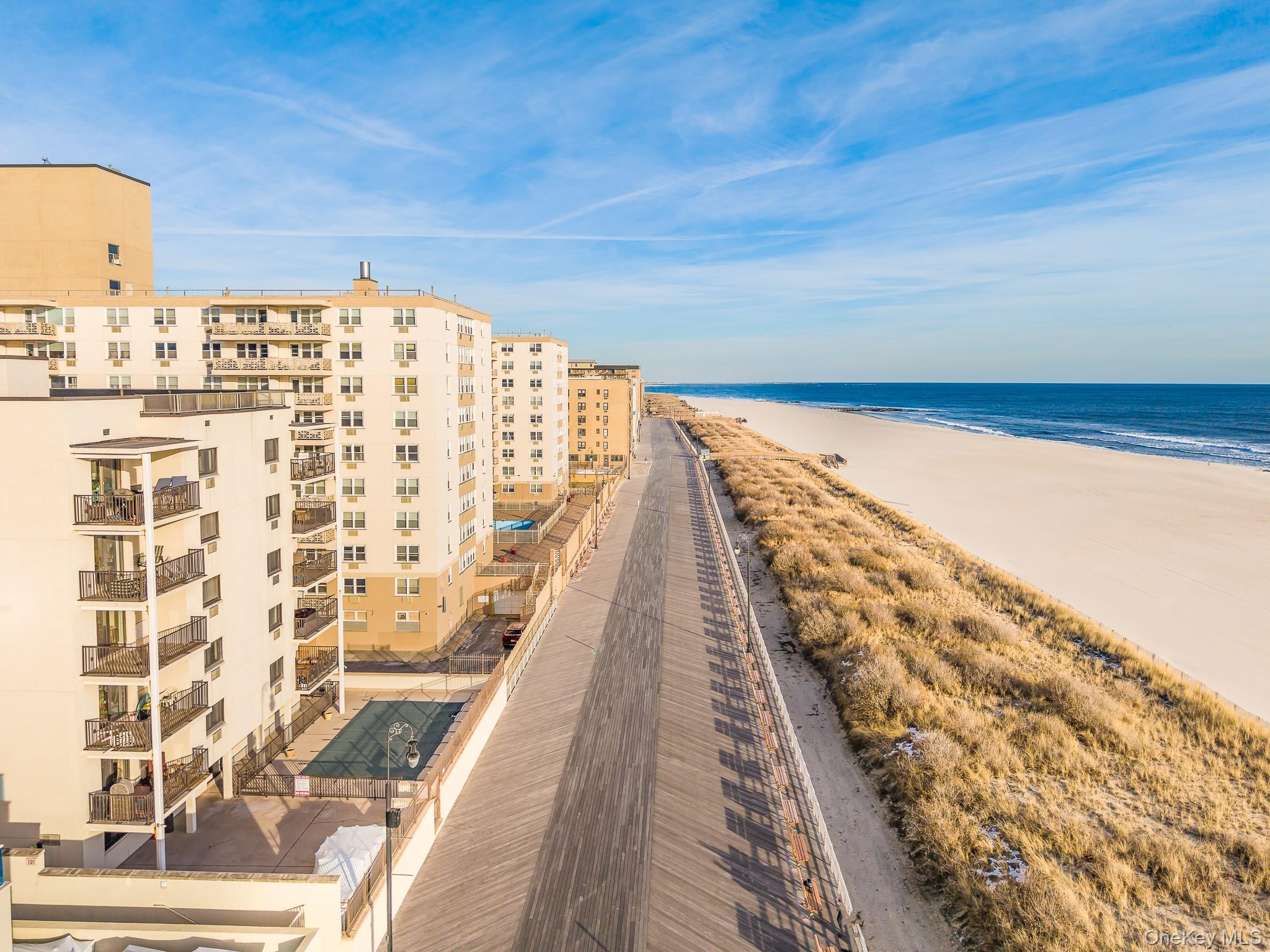 420 Shore Road, Unit 4C Long Beach, NY 11561 - Photo 27 of 41 a view of balcony with wooden floor