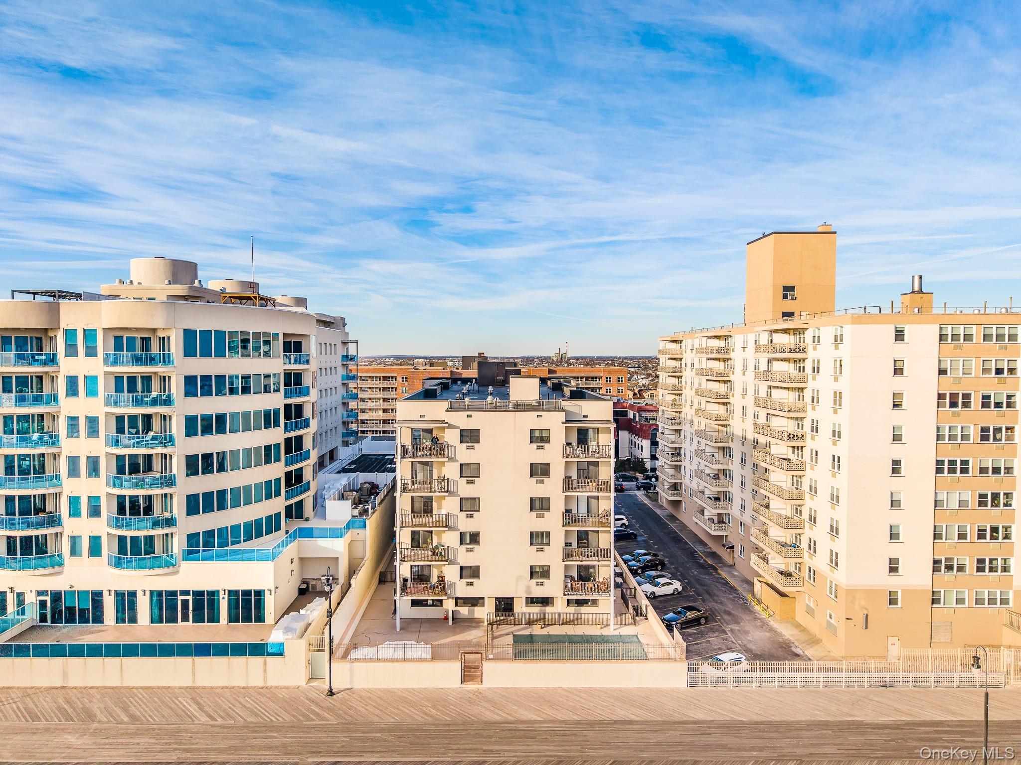 420 Shore Road, Unit 4C Long Beach, NY 11561 - Photo 32 of 41 a view of a city with tall buildings