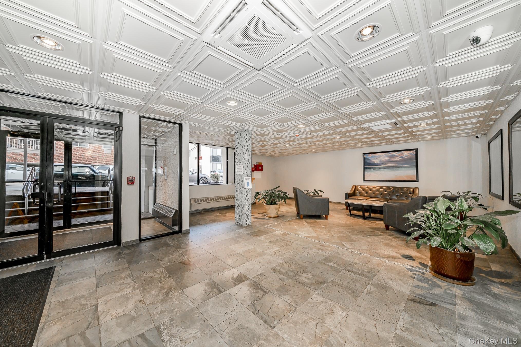 420 Shore Road, Unit 4C Long Beach, NY 11561 - Photo 4 of 41 a view of a room with gym equipment