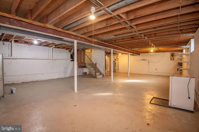 a view of a room with wooden walls