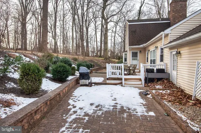 a view of a two chairs in the patio