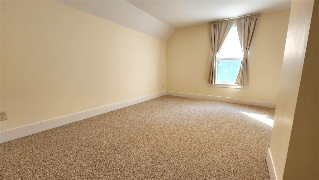 8 Fay Street, Unit 2 Westborough, MA 01581 - Photo 13 of 15 an empty room with windows
