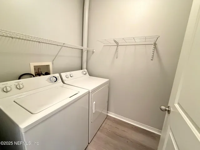 a utility room with dryer and washer