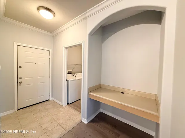 a bathroom with a bathtub and shower