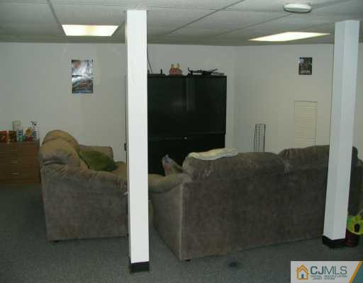 151 Salem Road North Brunswick, NJ 08902 - Photo 6 of 8 a living room with furniture