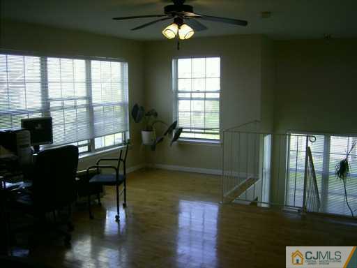 151 Salem Road North Brunswick, NJ 08902 - Photo 8 of 8 a view of a workspace with furniture and a window