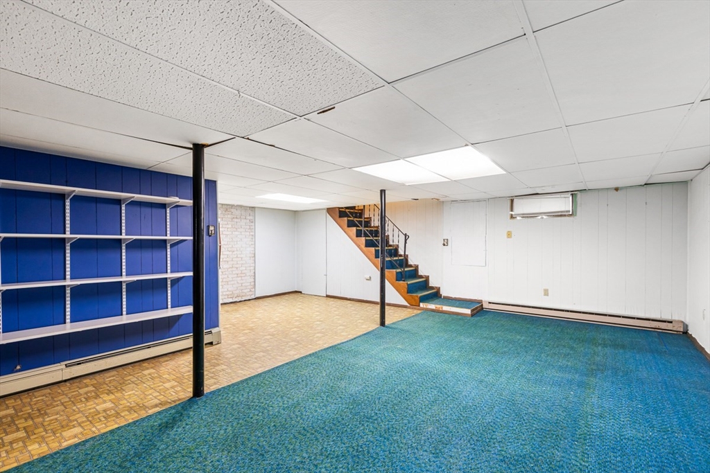 99 Swansom Road Swansea, MA 02777 - Photo 28 of 42 a view of an empty room with a staircase